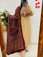 Adorn yourself in this exquisite cotton kurta set, featuring intricate embroidery and sequence work on the yoke