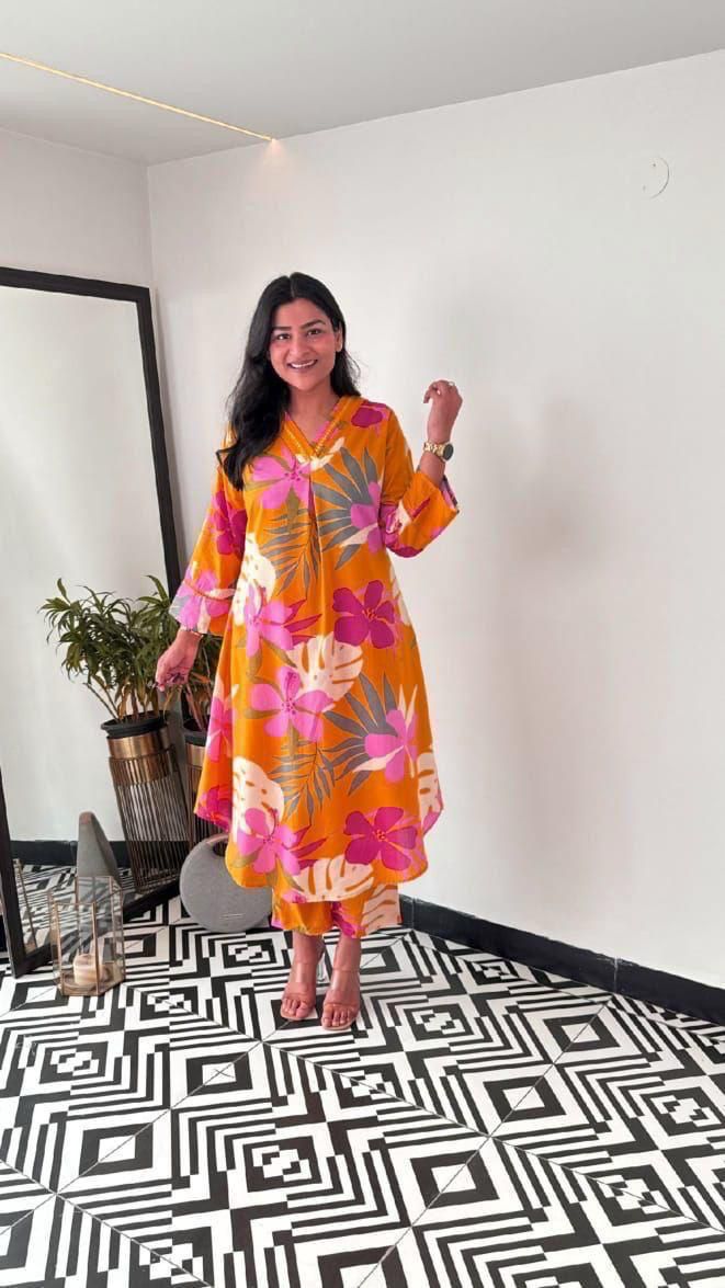 Cotton Floral Printed Kurta Pants With Lace Detailing On The Neckline and Cuffs.

Fabric: Cotton