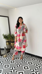 Cotton Floral Printed Kurta Pants With Lace Detailing On The Neckline and Cuffs.

Fabric: Cotton